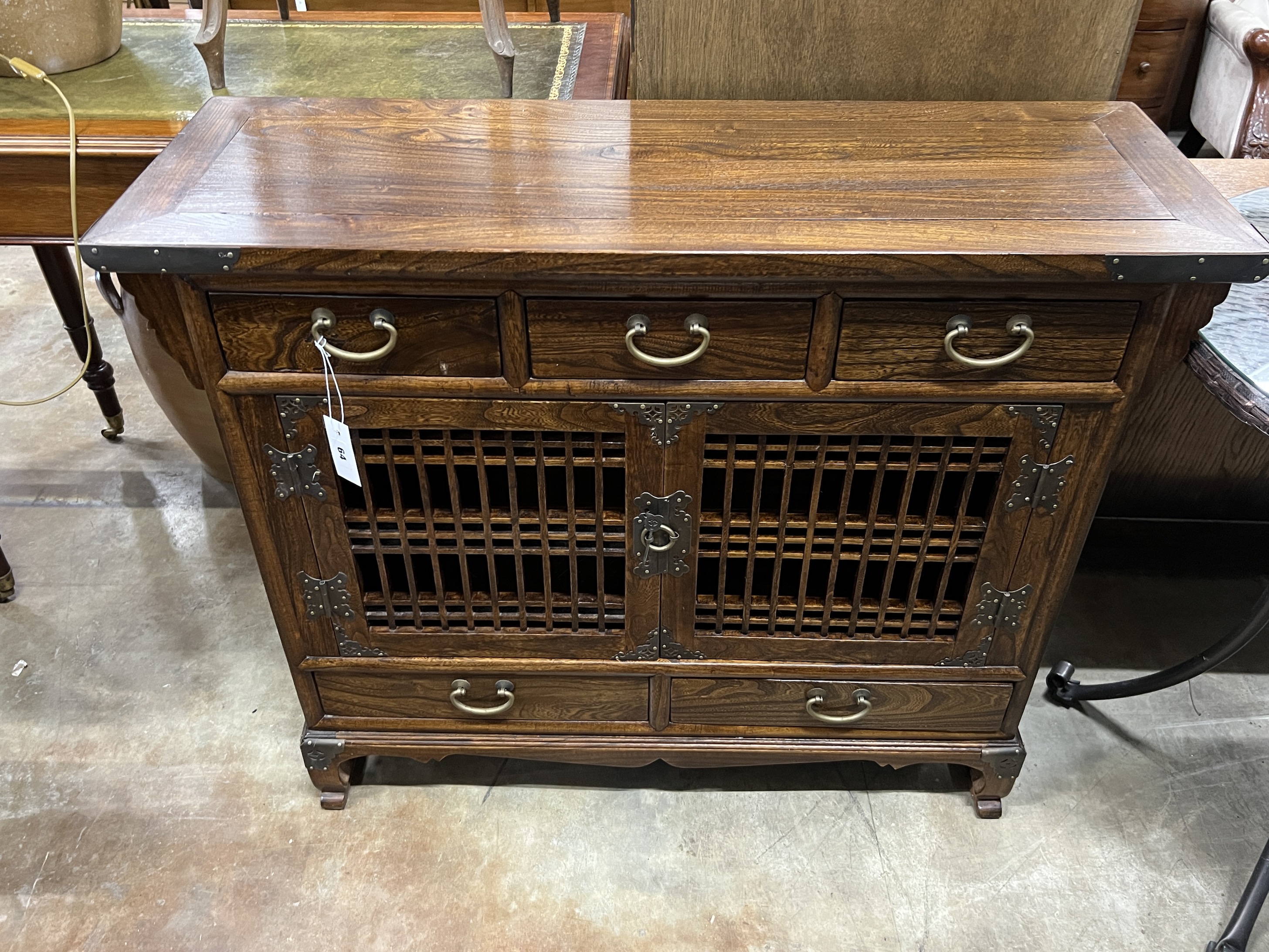 A Chinese brass mounted hardwood side cabinet, width 100cm, depth 35cm, height 82cm